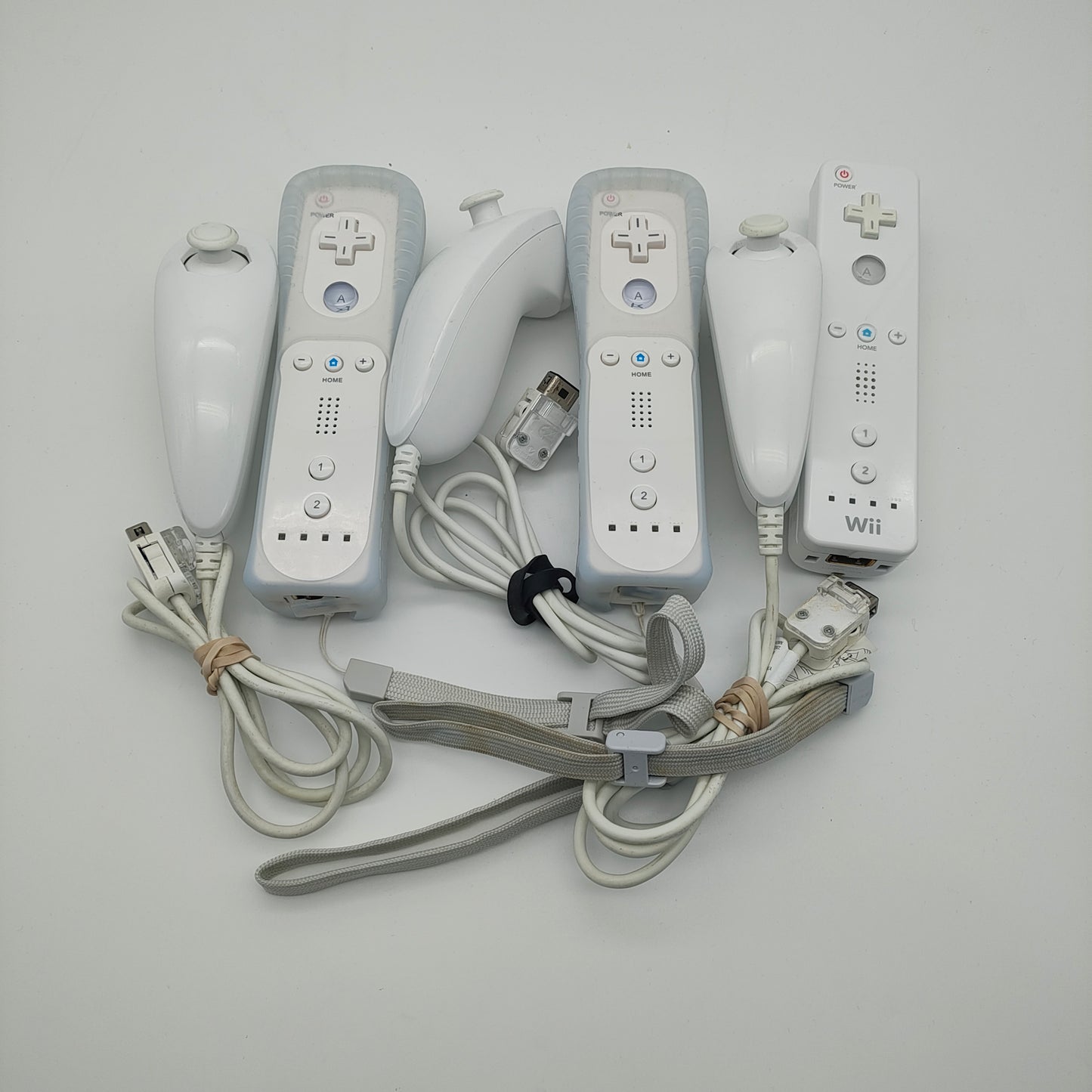 3 Nintendo White Wii Remotes and Nunchucks RVL-003 and RVL-004