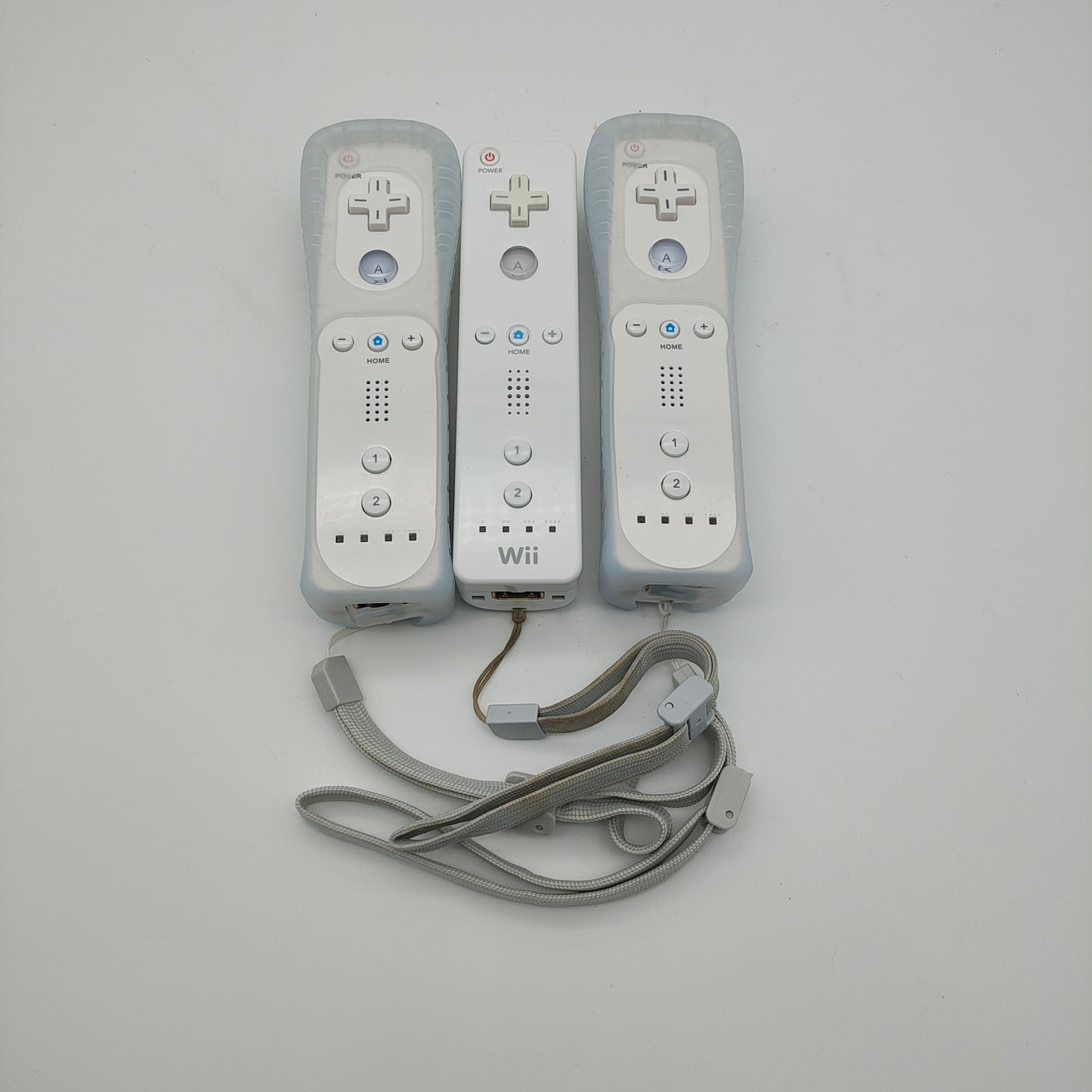 3 Nintendo White Wii Remotes and Nunchucks RVL-003 and RVL-004